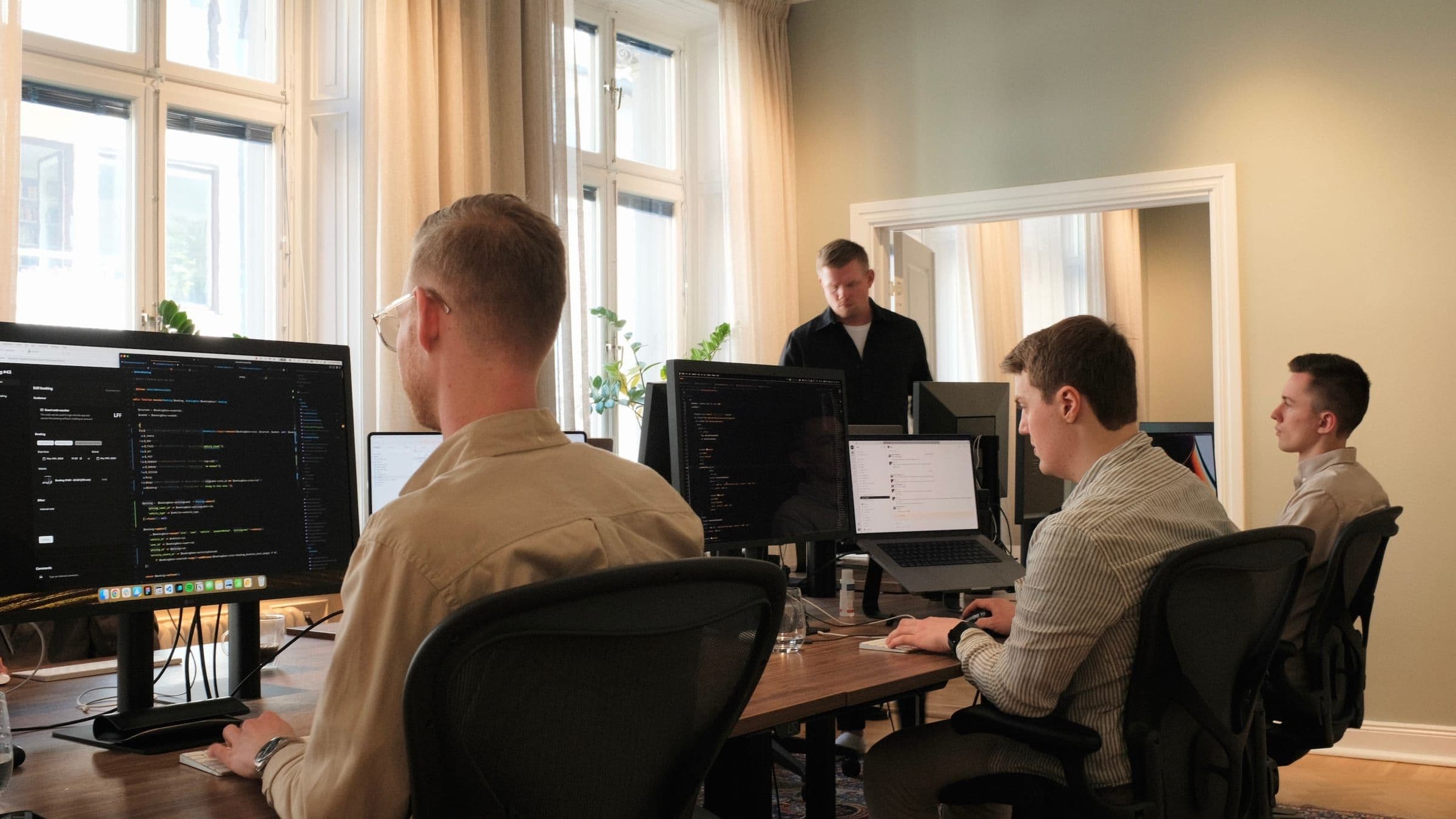 Engineers working alongside a customer team